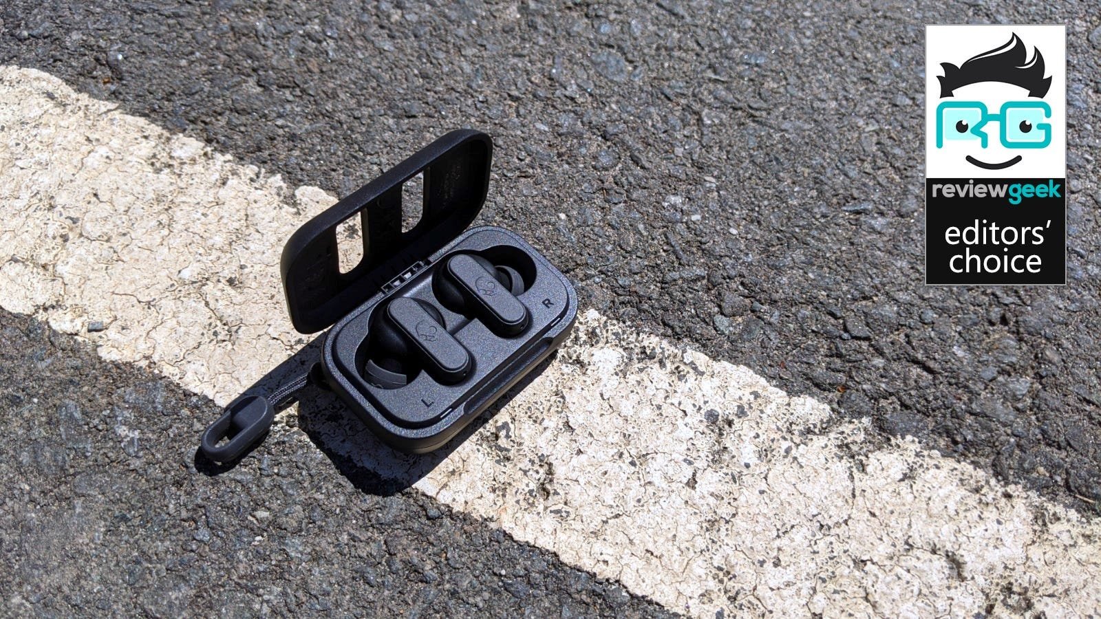 Skullcandy Dime Earbuds on pavement